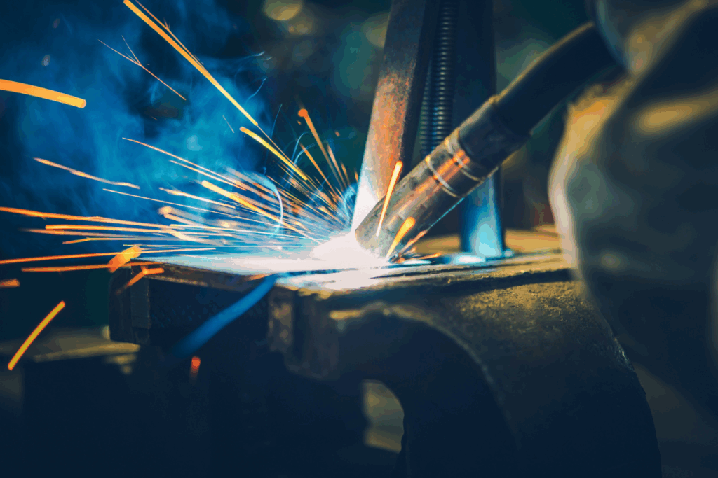 A Person Welding Precision Made Materials - Arrow Off Road - CNC Manufacturers